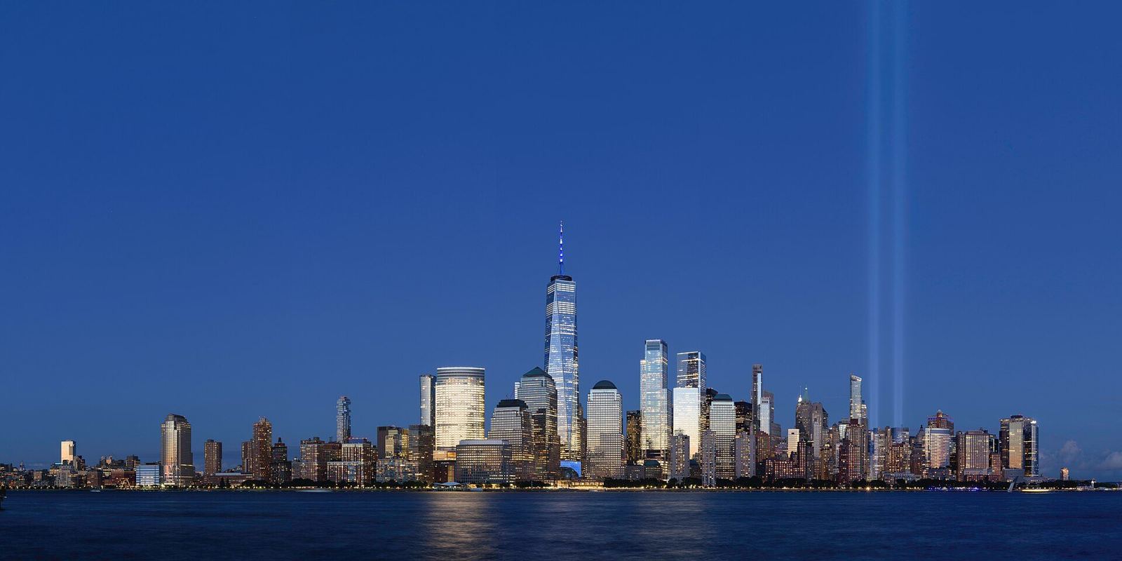 Lower Manhattan skyline across the Hudson River seen from Jersey City at dusk