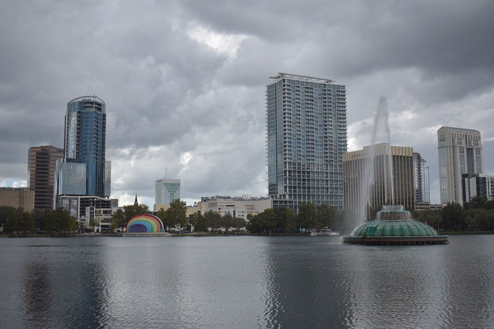 Orlando skyline and fountain reflected in Lake Eola