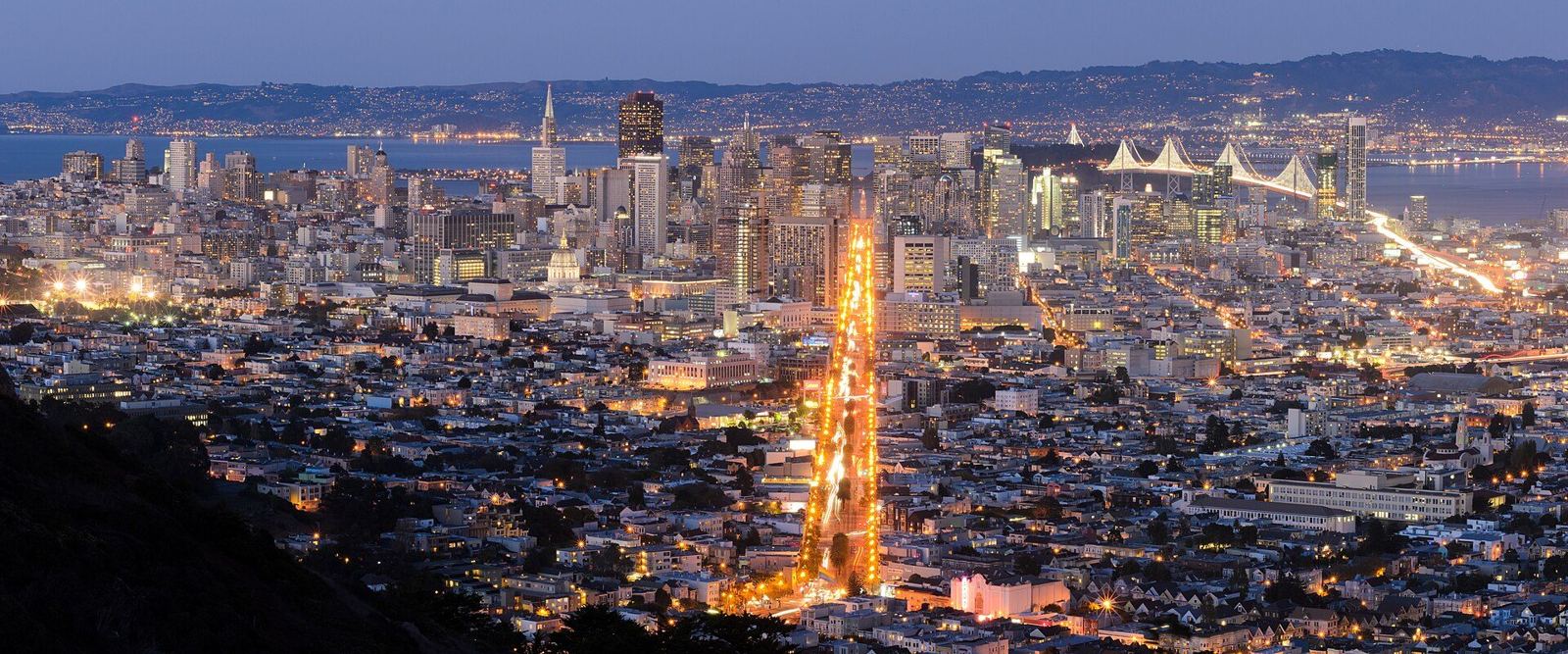 San Francisco skyline and Market Street at twilight seen from Twin Peaks